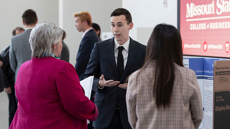 Management student making presentation