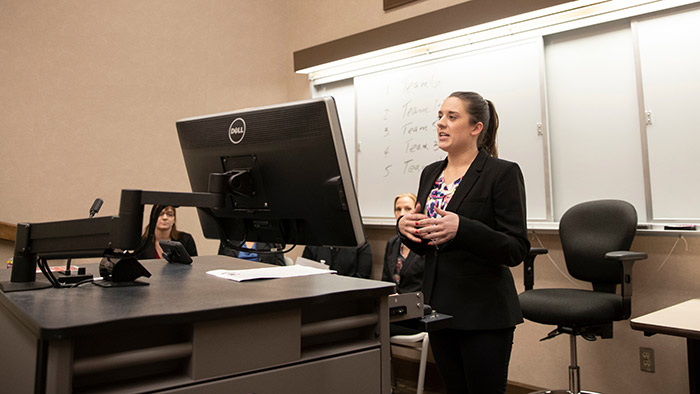 Health professions administrative leadership student making presentation